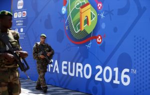 epa05351675 French soldiers patrol in front of the UEFA EURO 2016 fan zone in Nice, France, 08 June 2016. The UEFA EURO 2016 soccer championship takes place from 10 June to 10 July 2016 in France. EPA/ALI HAIDER
