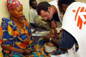 epa03824533 (FILE) A file photo dated 17 June 2003 showing doctors treating a Concolese baby at a 'Medecins sans frontieres' hospital near a refugee camp at Bunia airport, Congo. In a stament made public 14 August 2013 by Médecins Sans Frontières (MSF), 'the international medical humanitarian organisation Médecins Sans Frontières (MSF) announced the closure of all its programmes in Somalia, the result of extreme attacks on its staff in an environment where armed groups and civilian leaders increasingly support, tolerate, or condone the killing, assaulting, and abducting of humanitarian aid workers.' Médecins Sans Frontières (MSF) quit Somalia after working continuously in the country since 1991. EPA/MAURIZIO GAMBARINI