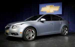 epa01461120 A general view of a life-size show property model of the Chevy Cruze that was unveiled during a press conference at the General Motors Lordstown Complex in Lordstown, Ohio, USA, 21 August 2008. The Cruze, GM's next generation small car, will be officially unveiled at the Paris Motor Show next month. EPA/DAVID MAXWELL