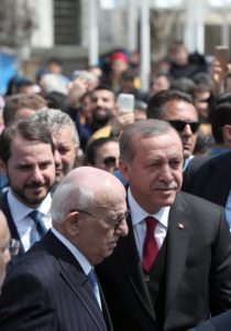 epa05912202 Turkish President Recep Tayyip Erdogan (R), Energy Minister Berat Albayrak (L) and Turkish parliamentary speaker Ismail Kahraman (C) greet people after praying at Eyup Sultan mosque, Istanbul, Turkey 17 April 2017. Media reports Turkish President Erdogan won a narrow lead of the 'Yes' vote in unofficial results, 17 April 2017. The proposed reform, passed by Turkish parliament on 21 January, would change the country's parliamentarian system of governance into a presidential one, which the opposition denounced as giving more power to Turkish President Erdogan. EPA/SEDAT SUNA