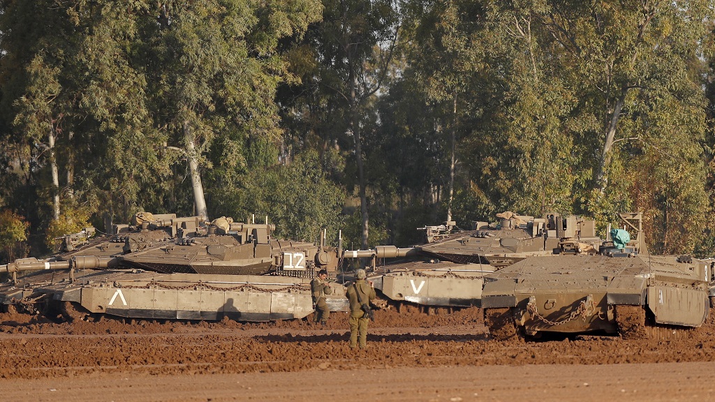 Israeli Army amasses military hardware and troops on border with Gaza