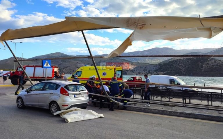 Κεφαλονιά: Θυελλώδεις άνεμοι ξήλωσαν σκίαστρο στο λιμάνι του Αργοστολίου – Δύο τραυματίες (video)