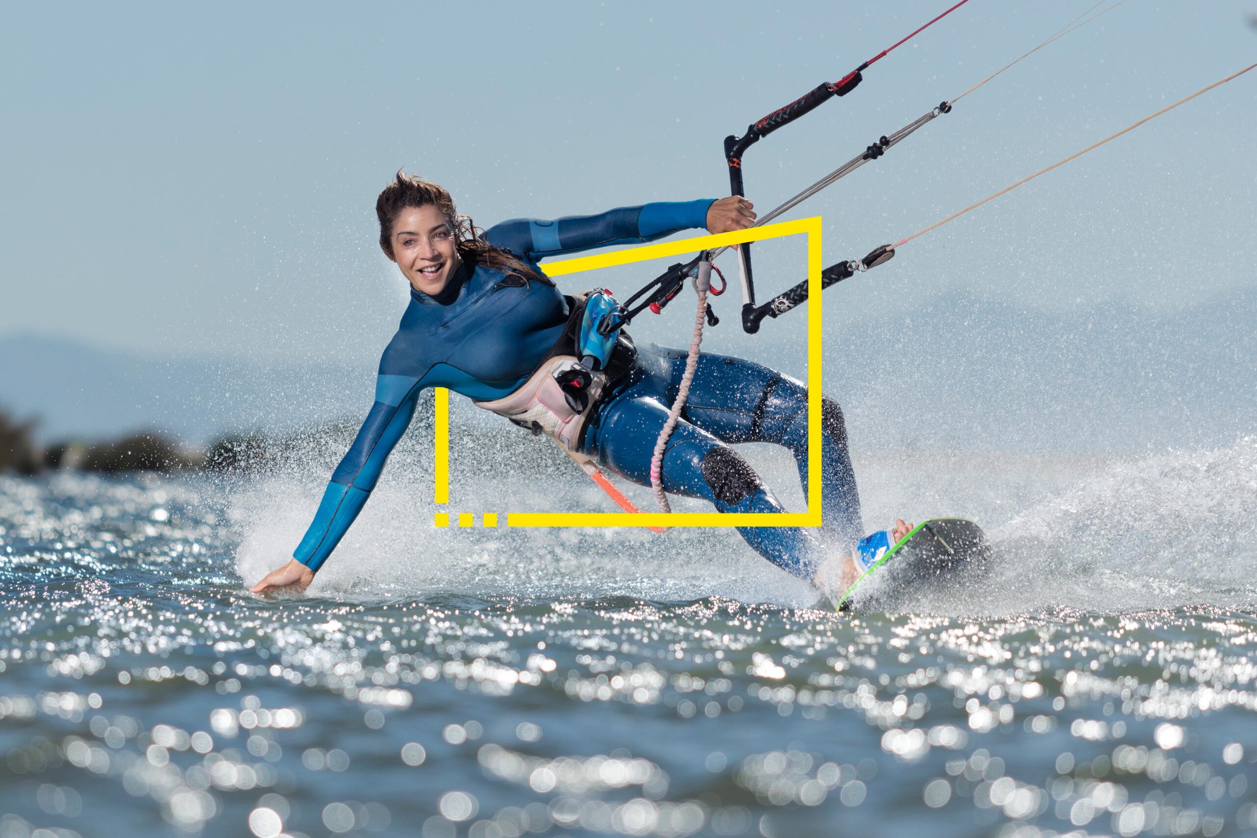 Female kite surfer, costa de la Luz, Andalusia, Spain