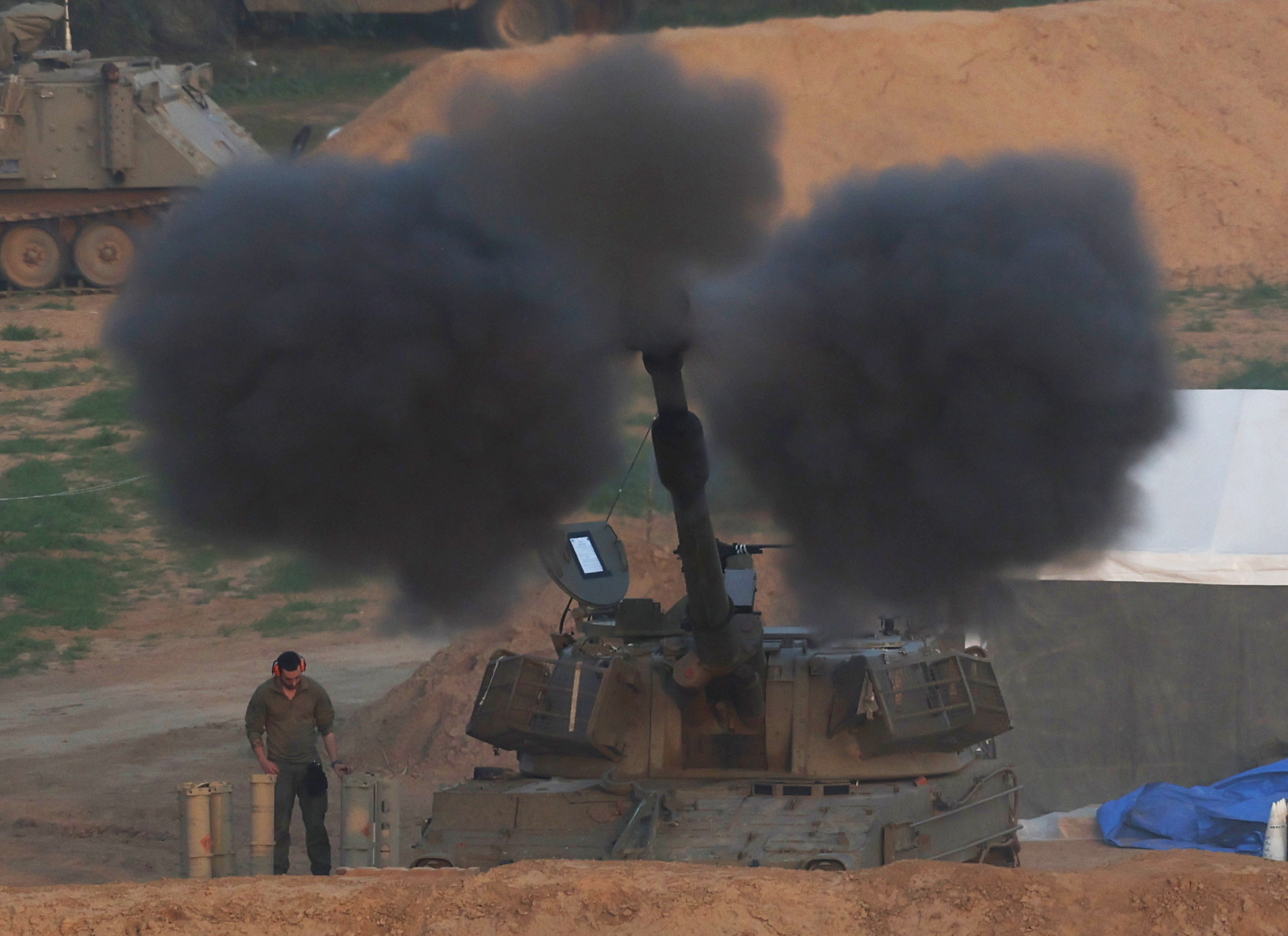 Israeli artillery units shelling toward targets in the southern part of the Gaza Strip
