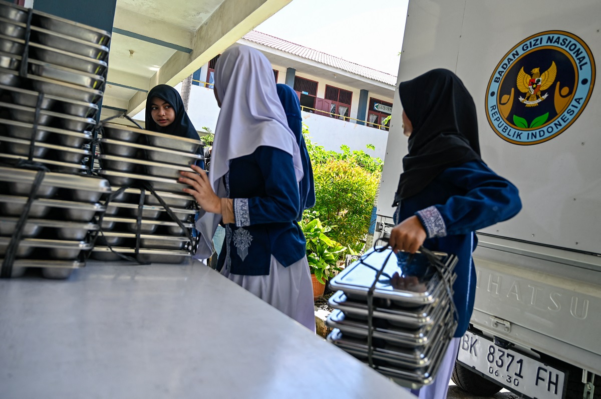 INDONESIA-MEALS-EDUCATION-POLITICS