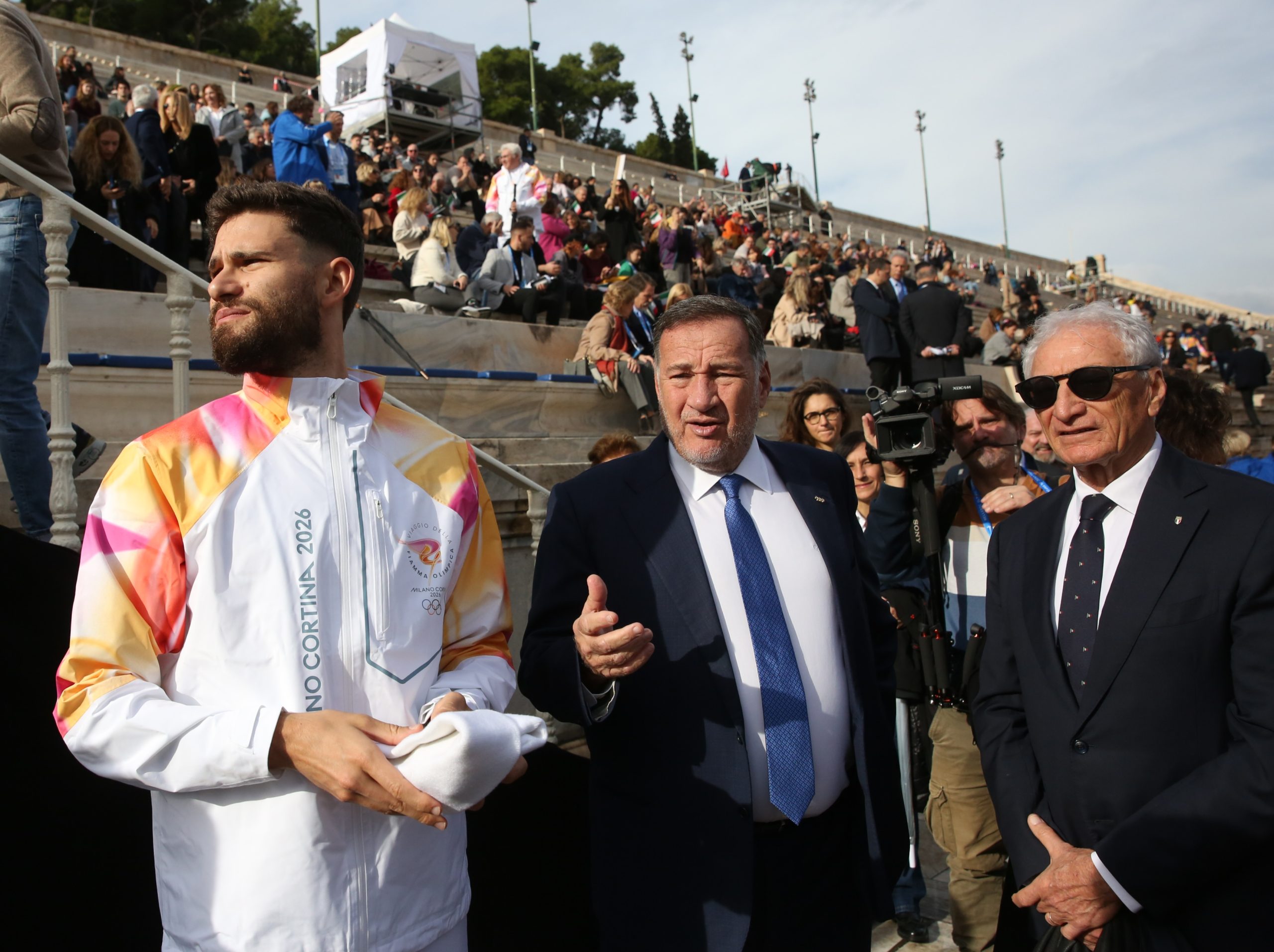 ΤΕΛΕΤΗ ΠΑΡΑΔΟΣΗΣ ΤΗΣ ΟΛΥΜΠΙΑΚΗΣ ΦΛΟΓΑΣ ΣΤΗΝ ΟΡΓΑΝΩΤΙΚΗ ΕΠΙΤΡΟΠΗ MILANO CORTINA 2026 Live η Τελετή Παράδοσης της Ολυμπιακής Φλόγας για τους Χειμερινούς Ολυμπιακούς Αγώνες